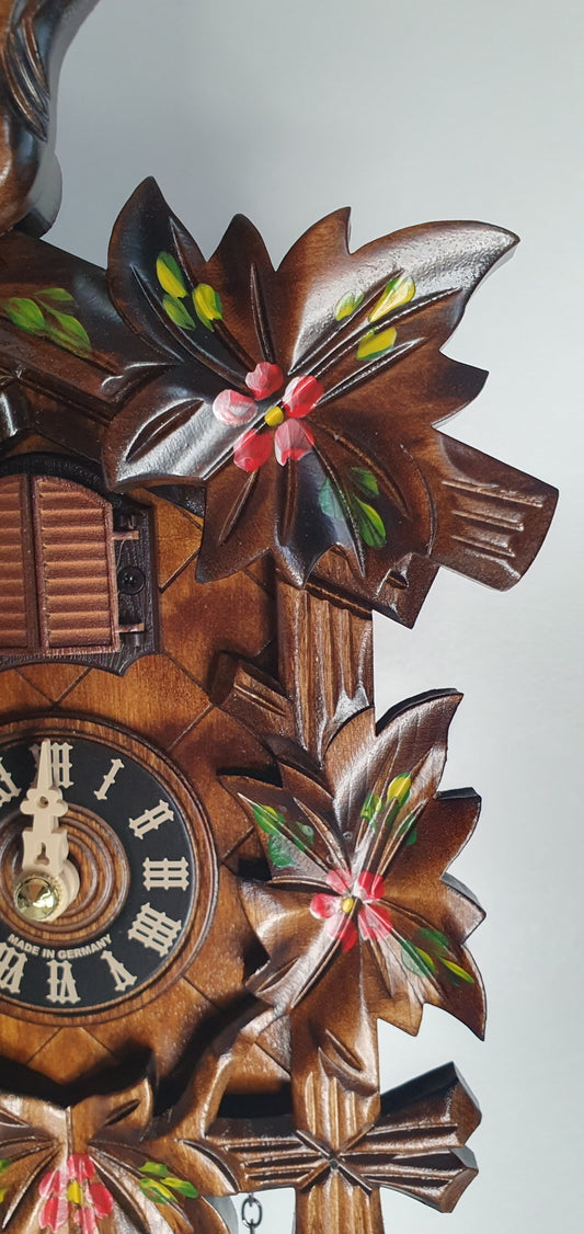 Cuckoo Clock with red hand painted flowers. Free delivery across Australia.